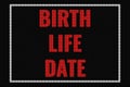 Birth Life Date text on dark screen