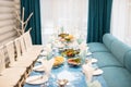 Birthday banguet served blue table before selebration