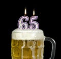 Birthday Beer for 65th Birthday Royalty Free Stock Photo