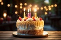 Birthday cake adorned by a lone, glowing candle on top