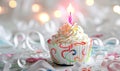 a birthday cake with a candle is shown behind white swirls