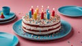 birthday cake with candles A birthday cake with white frosting and colorful sprinkles on a blue plate. Royalty Free Stock Photo