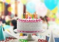 Birthday cake with candles on color background, 3d rendering Royalty Free Stock Photo