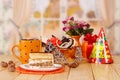 Birthday cake with cup of tea Royalty Free Stock Photo