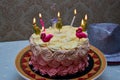 Birthday cake decorated with pineapple. Decorate with candles. And one number is an indication of age Royalty Free Stock Photo