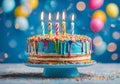 Colorful birthday cake with lit colored candles. Royalty Free Stock Photo