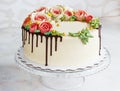 Birthday cake with flowers rose on white background Royalty Free Stock Photo