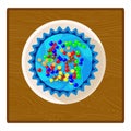 Birthday cake icon isometric vector. Multicoloured cake on wooden square table