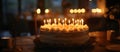 Birthday Cake With Lit Candles on Table Royalty Free Stock Photo
