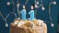 Birthday cake with 11 number candle on blue backgraund