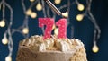 Birthday cake with 71 number pink candle on blue backgraund. Candles are set on fire Royalty Free Stock Photo