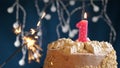 Birthday cake with 1 number pink candle and sparkler on blue backgraund Royalty Free Stock Photo