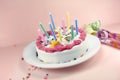 Birthday Cake and Party Blowers Royalty Free Stock Photo