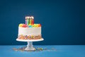 Colorful Birthday Cake Over Blue