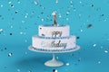 Birthday cake with silver letters and numer 1 on top