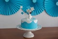 Birthday cake with snowman and stars on white background.