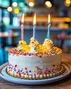 A birthday cake with three candles on top Royalty Free Stock Photo