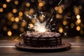 a birthday cake on a white plate with a sparkler on the side Royalty Free Stock Photo