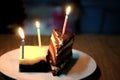 Birthday cakes distributed in a plate with candles