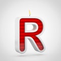 Birthday candle letter R uppercase isolated on white background. Royalty Free Stock Photo