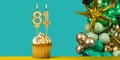Birthday candle number 81 - Cupcake with decoration on a green background