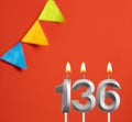 Birthday candle number 136 - Invitation card in red background