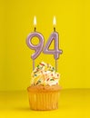 Birthday candle number 94 - Invitation card with yellow background