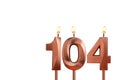 Birthday candle number 104 on white background