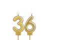 Birthday candle number 36 on white background