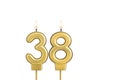 Birthday candle number 38 on white background