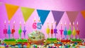 Birthday card with number 65 year. Happy birthday to six ten five year old. Candles burn with a festive cream cake. Greeting card Royalty Free Stock Photo