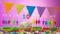 Birthday card with number 10 year. Happy birthday to a ten year old child on a beautiful pink background. Candles Royalty Free Stock Photo