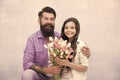 Birthday celebration. Man tulips bouquet. Father giving tulips girl. Dad with flowers. International womens day. Flower Royalty Free Stock Photo