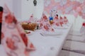 Birthday celebration table with decorative pink napkins