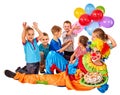 Birthday child clown playing with children. Kid cakes celebratory.