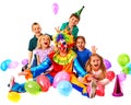 Birthday child clown playing with children. Kid cakes celebratory.