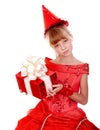 Birthday child girl in red dress with gift box.