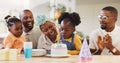 Birthday, children party and applause with a family in celebration of a girl child in their home. African parents Royalty Free Stock Photo