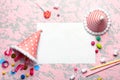 Birthday composition with party items and blank card on color background
