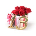 Birthday concept with red roses in gift isolated on white background. thirteenth Royalty Free Stock Photo