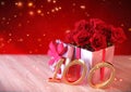 Birthday concept with red roses in gift on wooden desk. hundredth. 100th. 3D render