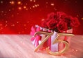 Birthday concept with red roses in gift on wooden desk. seventyfifth. 75th. 3D render