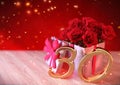 Birthday concept with red roses in the gift on wooden desk. 30th. 3D render