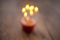 Birthday cupcake blurry background with lots of lit candles Royalty Free Stock Photo