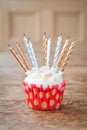 Birthday cupcake blurry background with lots of lit candles Royalty Free Stock Photo