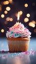 Birthday cupcake with burning candle, closeup, light background