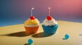 birthday cupcake with candle A realistic scene of two birthday cupcakes with a candle