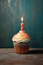 birthday cupcake with a single lit candle Royalty Free Stock Photo