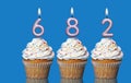 Birthday Cupcakes With Candles Lit Forming The Number 682 Royalty Free Stock Photo
