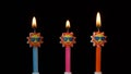 Birthday festive candles in form of sun in sunglasses isolated on black background Royalty Free Stock Photo